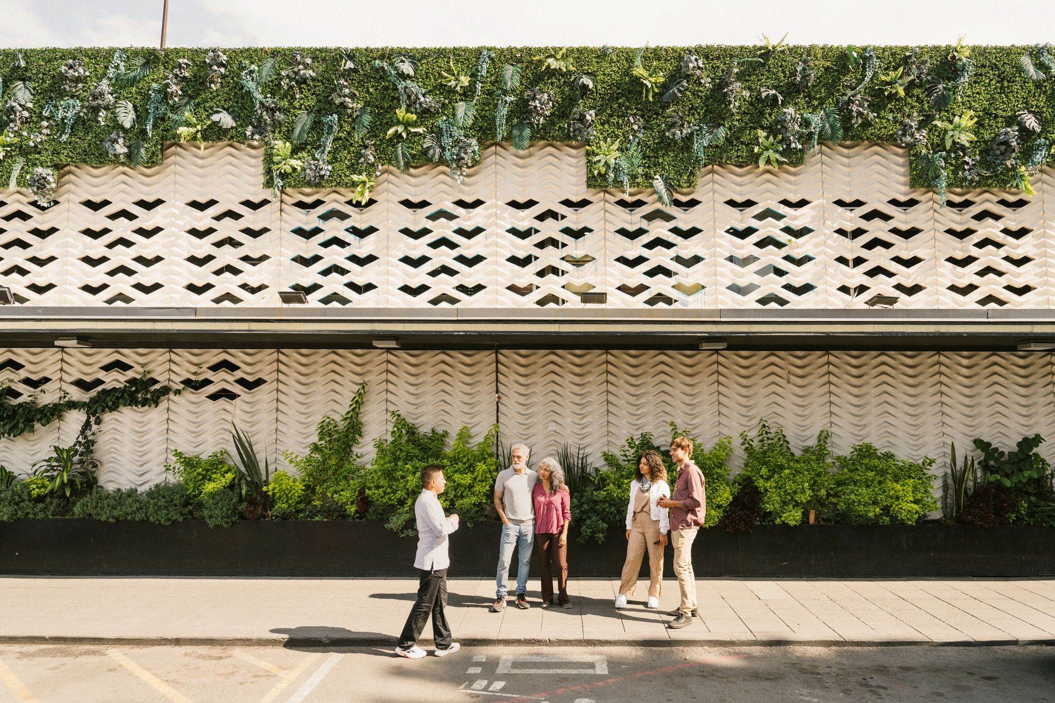 Creative community gathered in a gallery-style setting