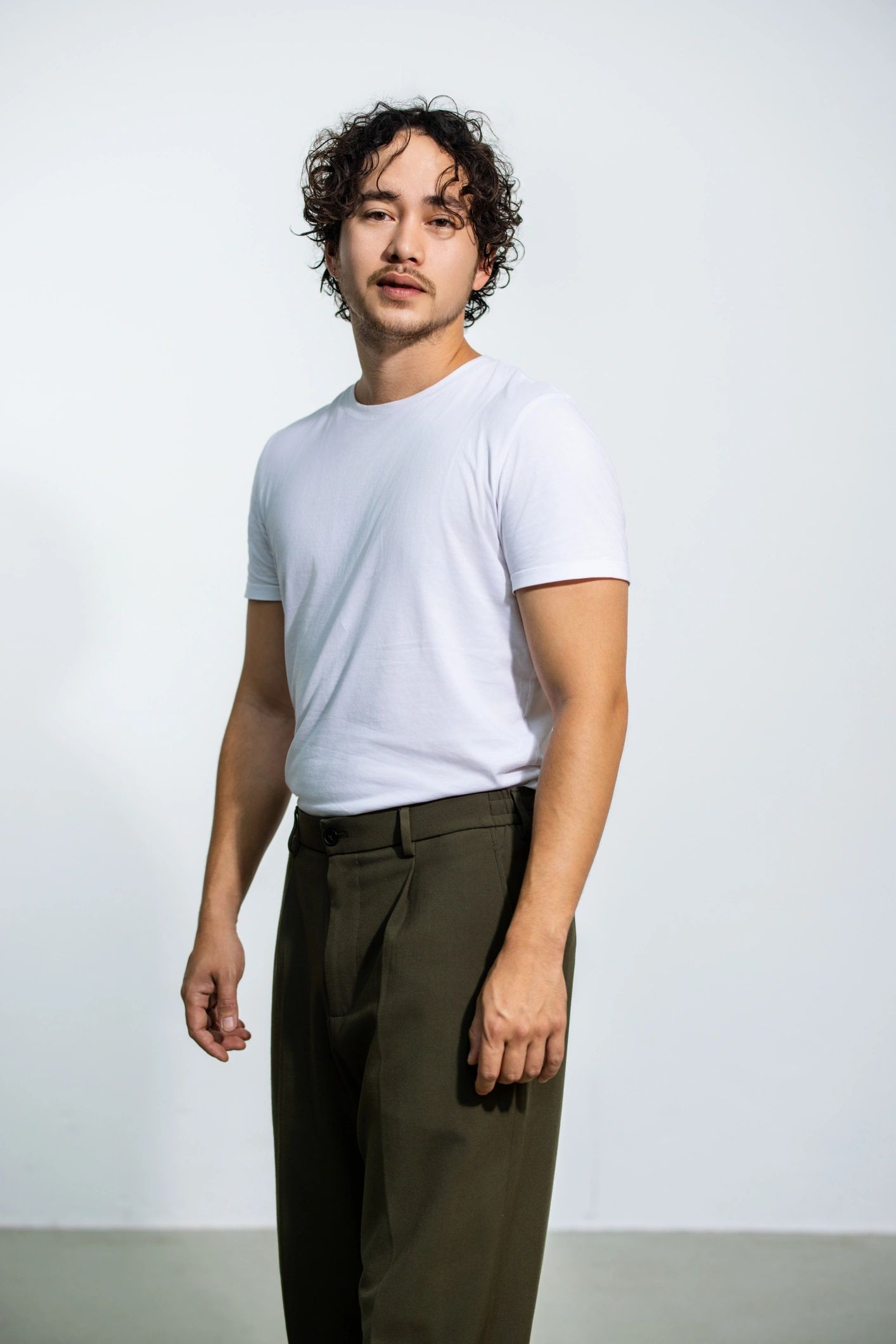 Portrait representing the curatorial lead